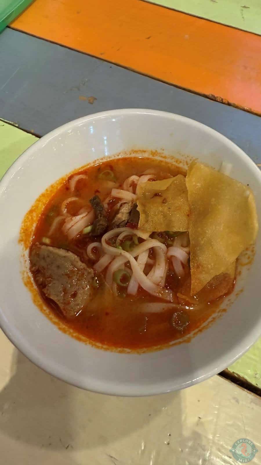 Khaw Soi Beef Soup which came with egg noodles, beef and spice in a bowl