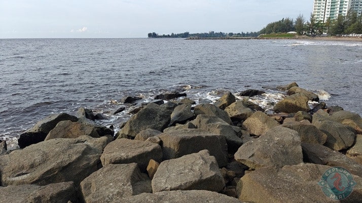 Tanjong Lobang Beach Pier With Condominium View