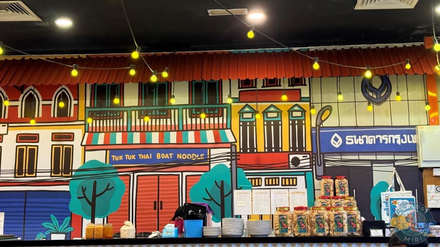 one big wall looked like a painting of a Thai street with little shops