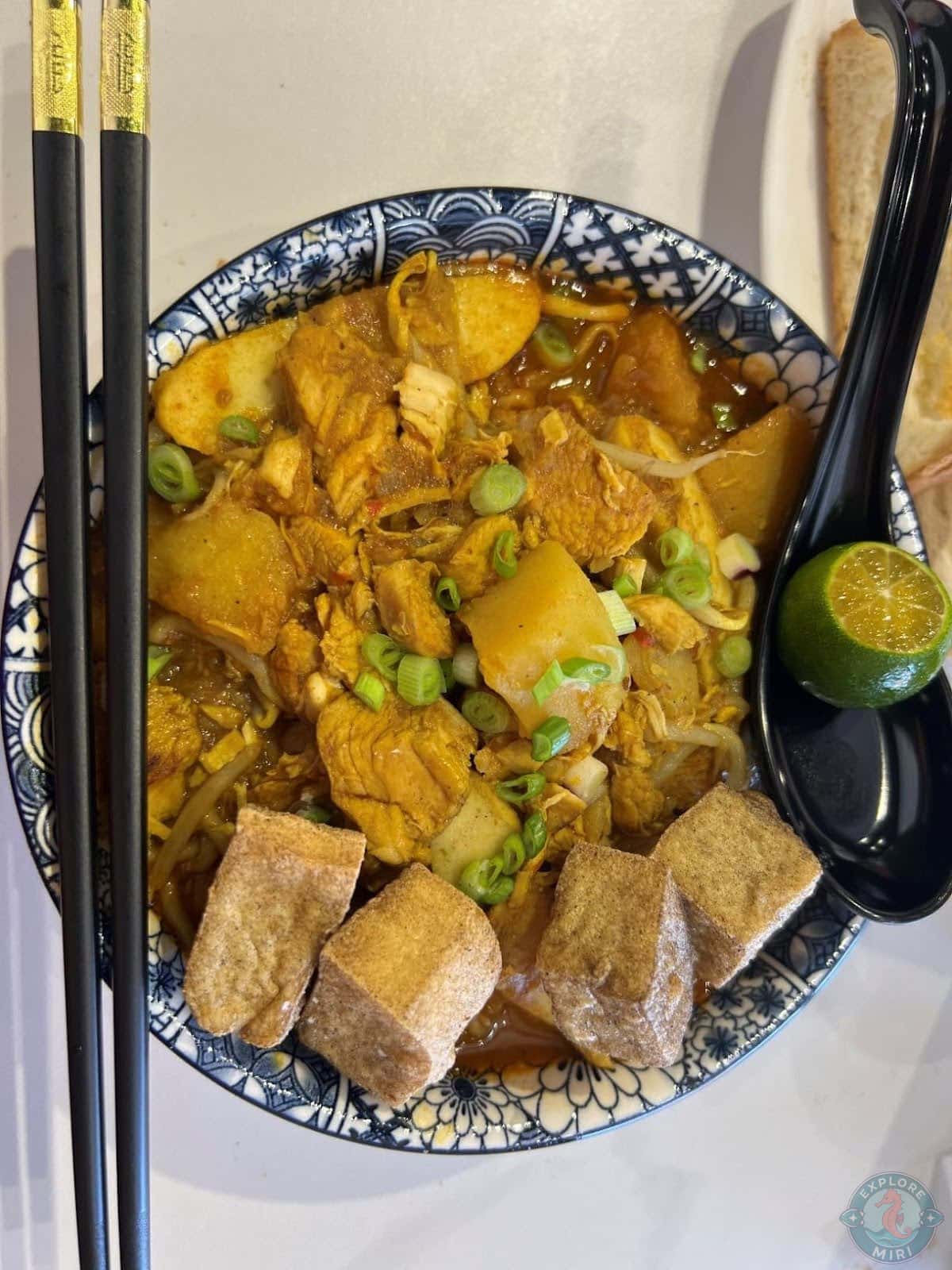 Mee Curry came with a rich broth and soft noodles, served with a lemon