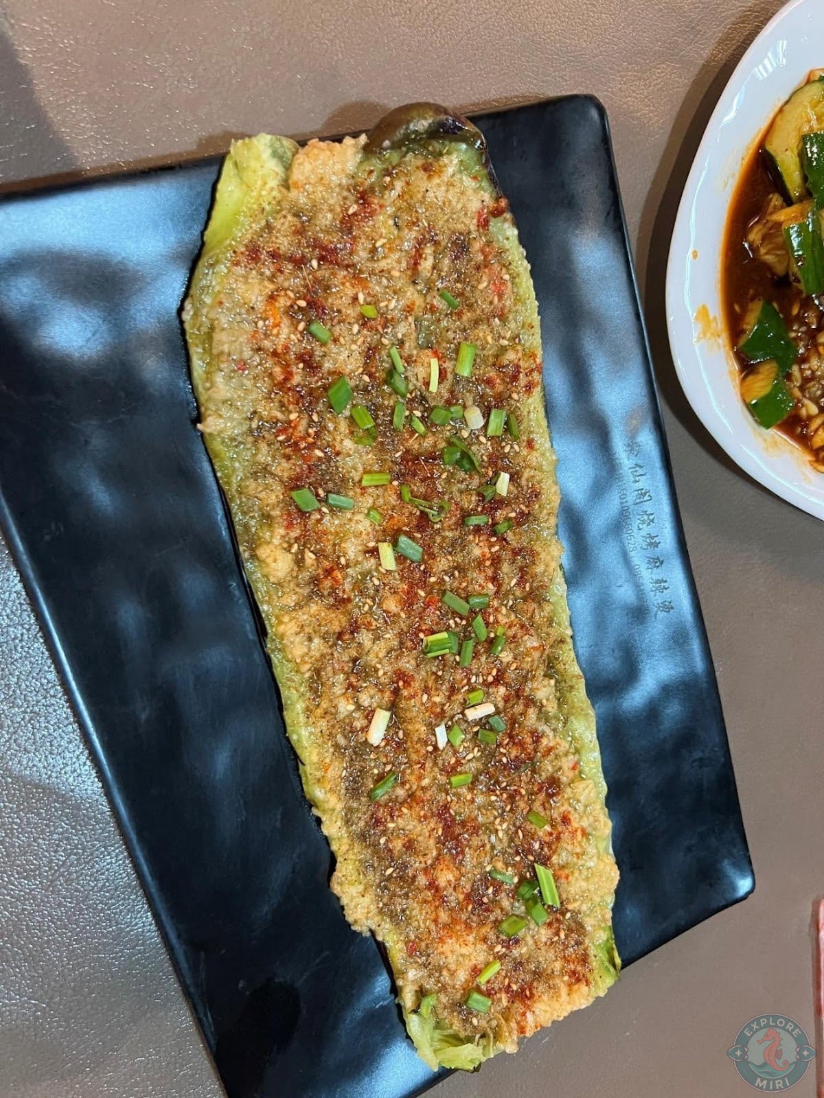 grilled eggplant which was perfectly charred with spring onion on top