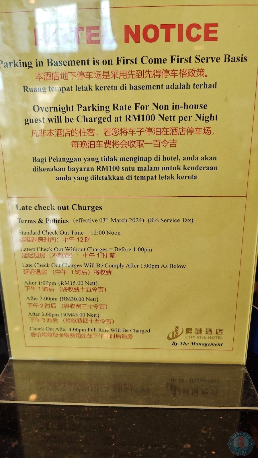 instruction standee with rates with charges listed