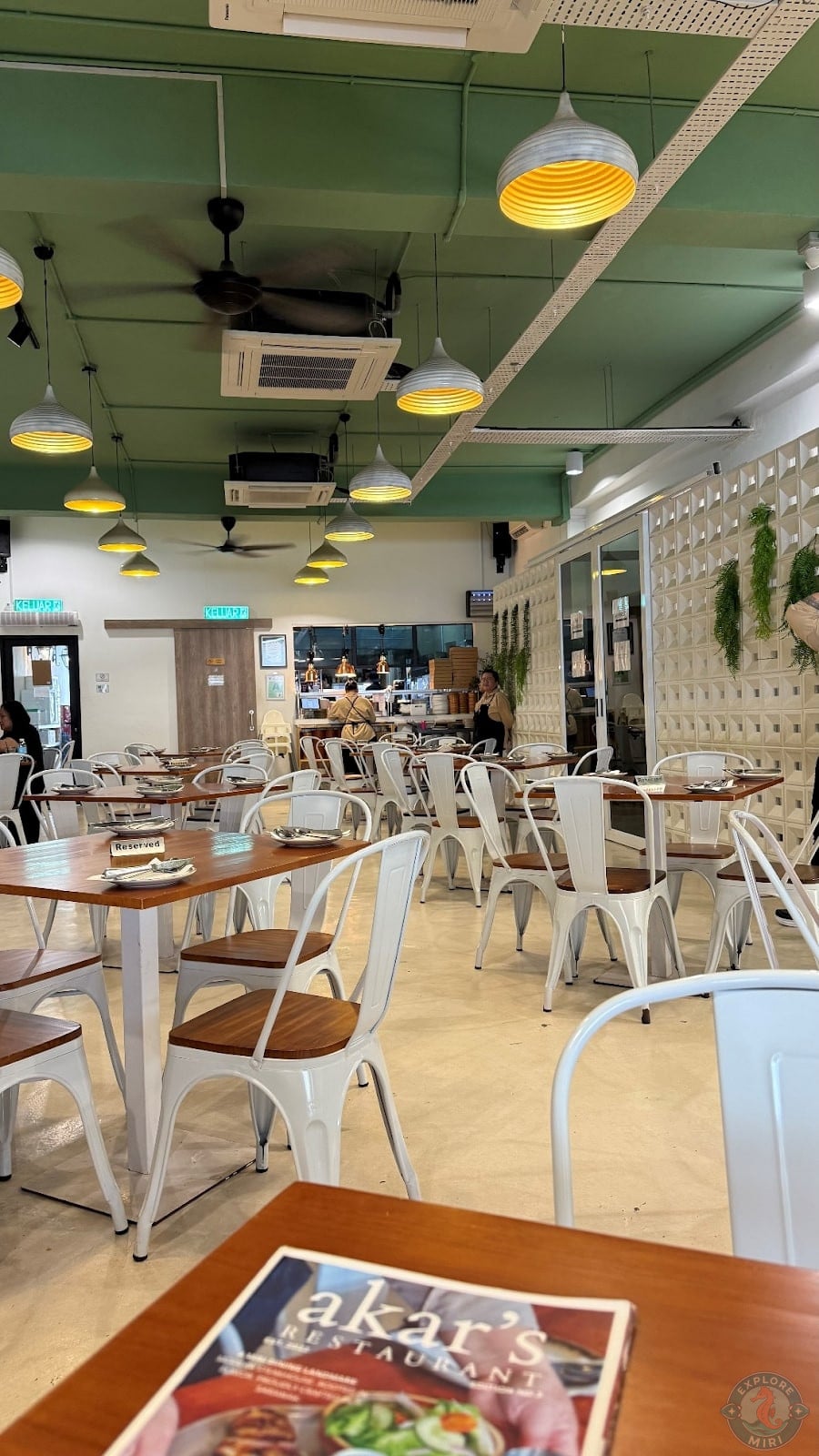 minimal and welcoming interior with a simple seating arrangement of 4