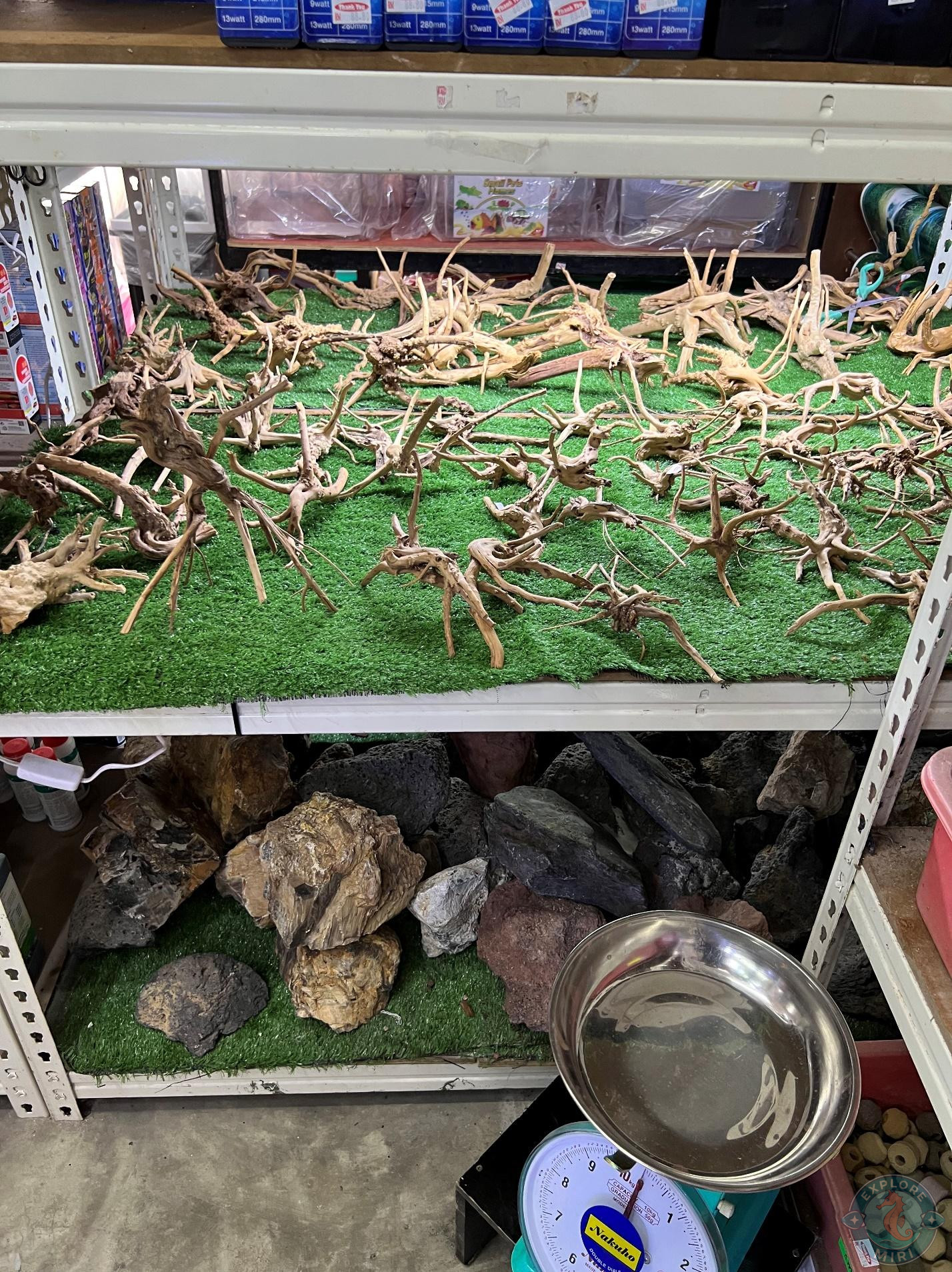 some big rocks sold by weight and some dried twigs