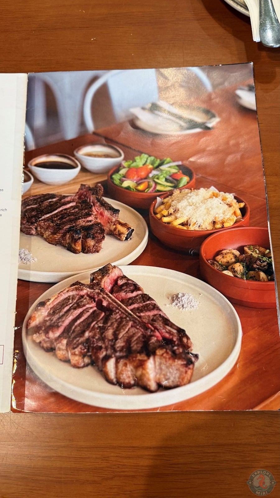 steak menu which offered various cuts with sides to go along with it