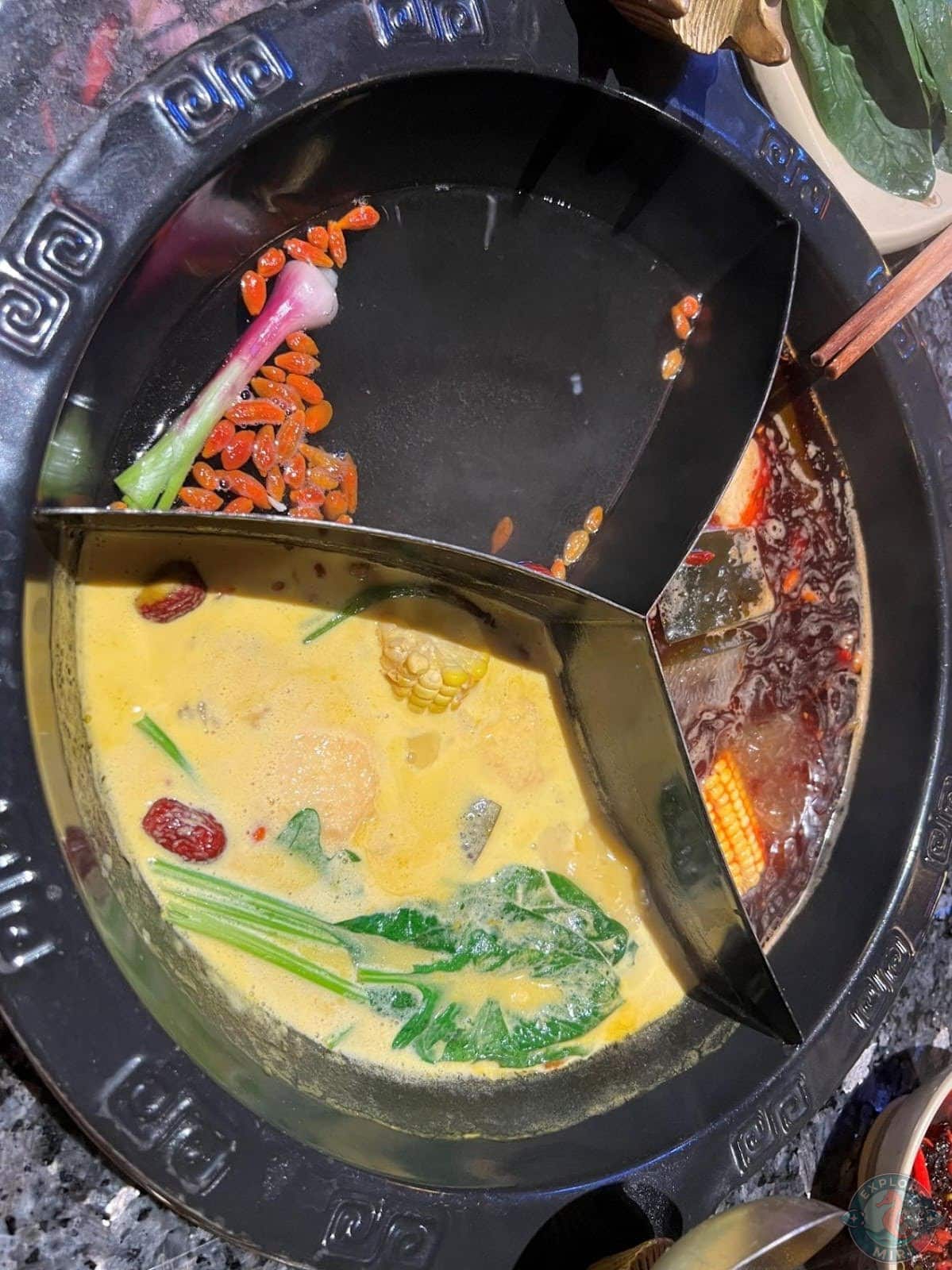 two soup base hot pot, 1 spicy and 1 creamy base