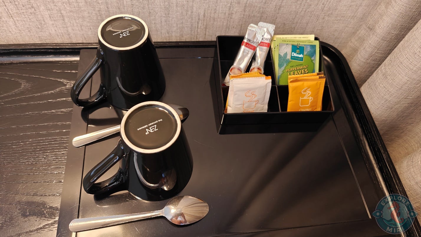 Along with two mugs and spoons, the hotel had provided tea and coffee sachets