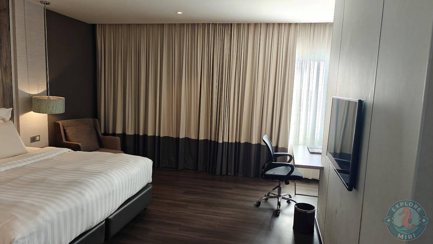 Curtains had been drawn across the wall of windows for more privacy