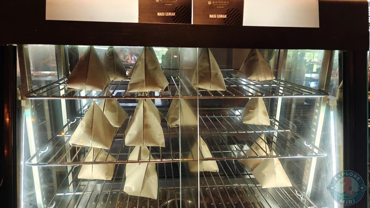 Paper bags of Nasi Lemak