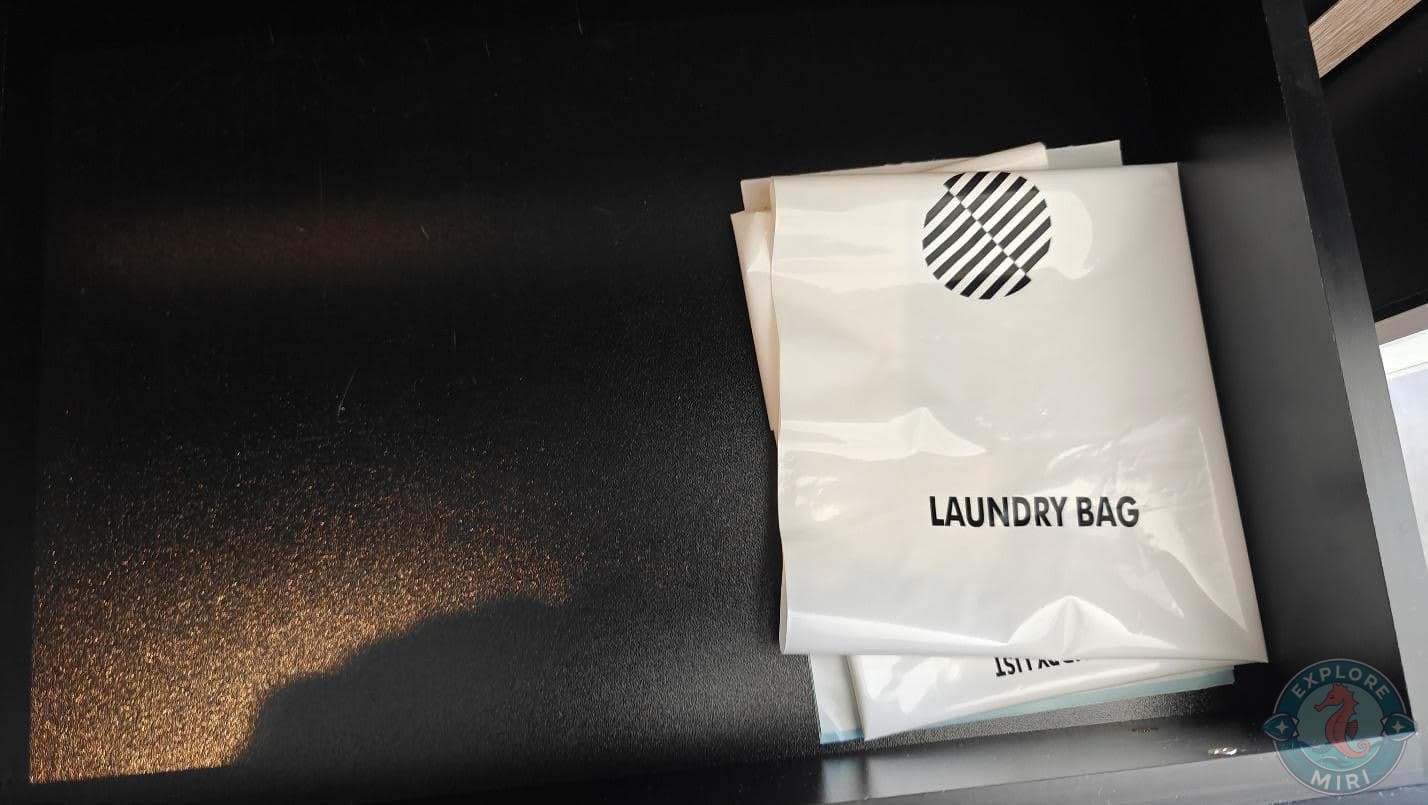 amenities like laundry bags and bedroom slippers