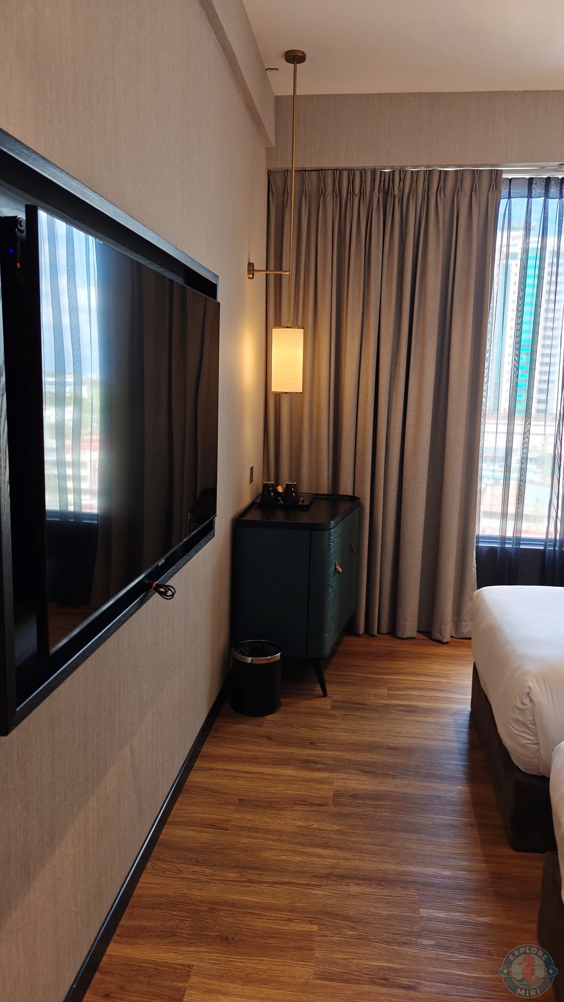 huge TV screen hung on the wall